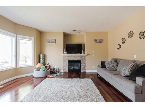 136 Ward Crescent, Fort Mcmurray, AB - Indoor Photo Showing Living Room With Fireplace