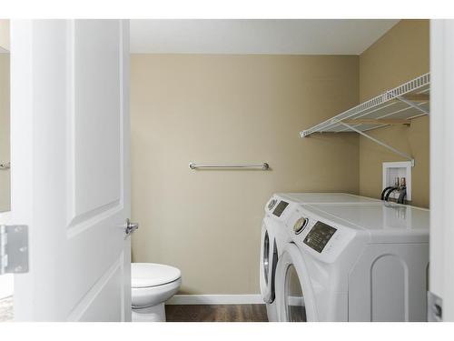 724-201 Abasand, Fort Mcmurray, AB - Indoor Photo Showing Laundry Room