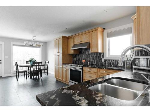 299 Warren Road, Fort Mcmurray, AB - Indoor Photo Showing Kitchen With Double Sink