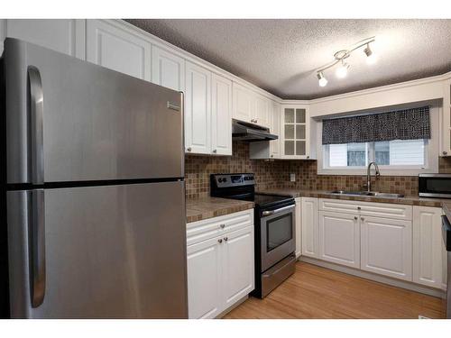 257 Caouette Crescent, Fort Mcmurray, AB - Indoor Photo Showing Kitchen With Double Sink
