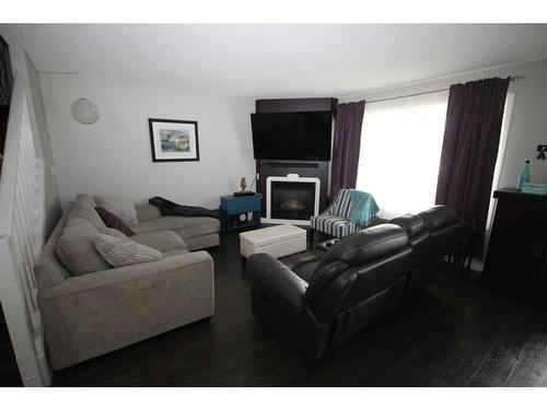236 Sitka Drive, Fort Mcmurray, AB - Indoor Photo Showing Living Room With Fireplace