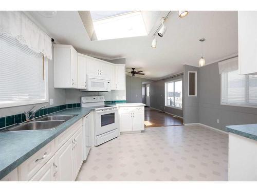 296 Cree Road, Fort Mcmurray, AB - Indoor Photo Showing Kitchen With Double Sink