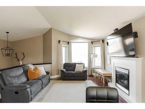 101 Lanauze Street, Fort Mcmurray, AB - Indoor Photo Showing Living Room With Fireplace