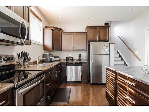 101 Lanauze Street, Fort Mcmurray, AB - Indoor Photo Showing Kitchen With Double Sink