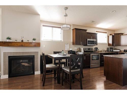 101 Lanauze Street, Fort Mcmurray, AB - Indoor Photo Showing Other Room With Fireplace