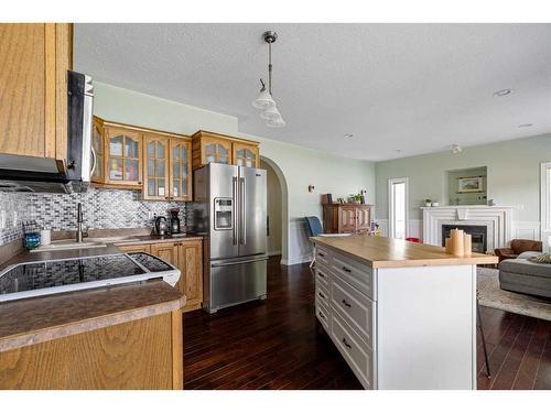306 Berard Crescent, Fort Mcmurray, AB - Indoor Photo Showing Kitchen With Fireplace With Double Sink
