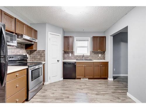 43-100 St.Laurent Way, Fort Mcmurray, AB - Indoor Photo Showing Kitchen