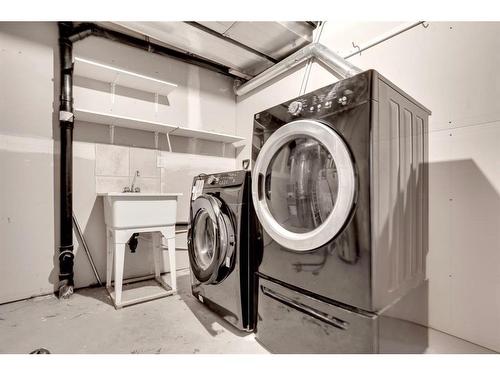 43-100 St.Laurent Way, Fort Mcmurray, AB - Indoor Photo Showing Laundry Room