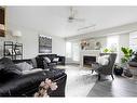 21-264 J W Mann, Fort Mcmurray, AB  - Indoor Photo Showing Living Room With Fireplace 