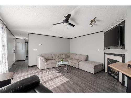 104 Harpe Way, Fort Mcmurray, AB - Indoor Photo Showing Living Room With Fireplace