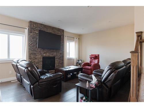 132 Gravelstone Road, Fort Mcmurray, AB - Indoor Photo Showing Living Room With Fireplace