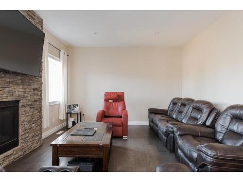 132 Gravelstone Road, Fort Mcmurray, AB - Indoor Photo Showing Living Room With Fireplace