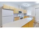 4106-200 Lougheed Drive, Fort Mcmurray, AB  - Indoor Photo Showing Kitchen With Double Sink 