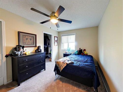 136 Burton Place, Fort Mcmurray, AB - Indoor Photo Showing Bedroom