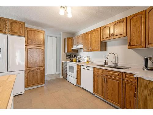 14 Moberly Crescent, Fort Mcmurray, AB - Indoor Photo Showing Kitchen With Double Sink