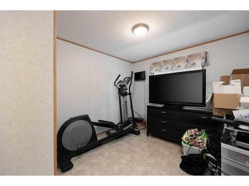 209 Waterhouse Street, Fort Mcmurray, AB - Indoor Photo Showing Gym Room