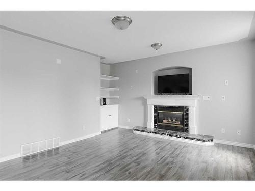 168 Bussieres Drive, Fort Mcmurray, AB - Indoor Photo Showing Living Room With Fireplace