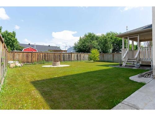 168 Bussieres Drive, Fort Mcmurray, AB - Outdoor With Backyard