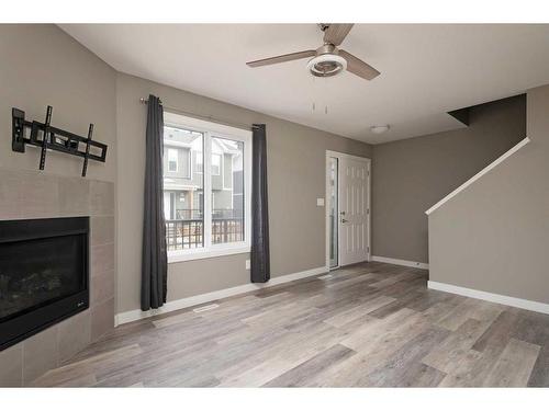 14-401 Athabasca Avenue, Fort Mcmurray, AB - Indoor Photo Showing Living Room With Fireplace