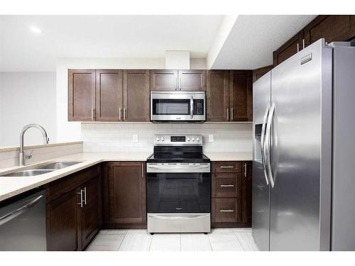Unit# 36-284 Shalestone Way, Fort Mcmurray, AB - Indoor Photo Showing Kitchen With Stainless Steel Kitchen With Double Sink