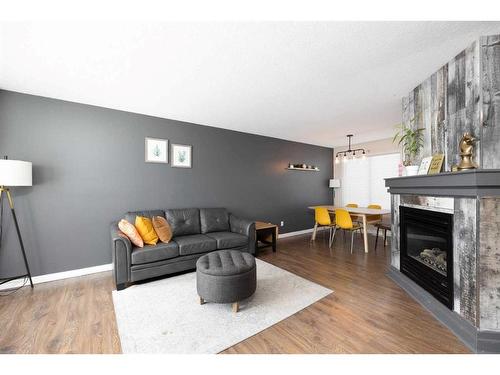 503-105 Loutit Road, Fort Mcmurray, AB - Indoor Photo Showing Living Room With Fireplace