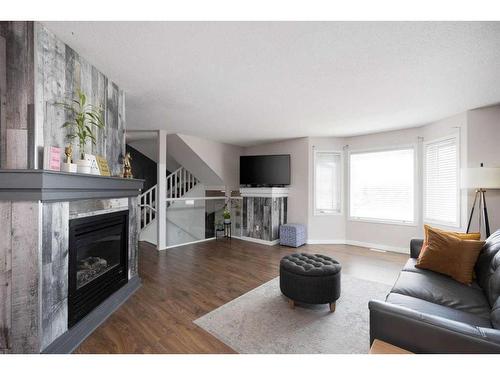 503-105 Loutit Road, Fort Mcmurray, AB - Indoor Photo Showing Living Room With Fireplace