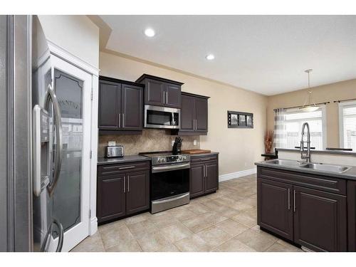 118 Pebble Lane, Fort Mcmurray, AB - Indoor Photo Showing Kitchen With Stainless Steel Kitchen With Double Sink