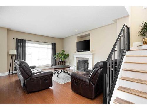 118 Pebble Lane, Fort Mcmurray, AB - Indoor Photo Showing Living Room With Fireplace