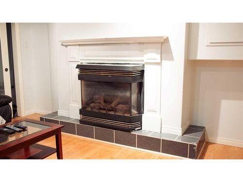 125 Cameron Drive, Fort Mcmurray, AB - Indoor Photo Showing Living Room With Fireplace