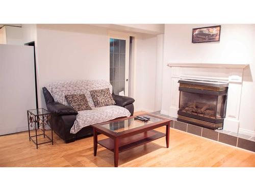 125 Cameron Drive, Fort Mcmurray, AB - Indoor Photo Showing Living Room With Fireplace