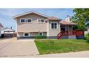 125 Cameron Drive, Fort Mcmurray, AB  - Outdoor With Deck Patio Veranda With Facade 