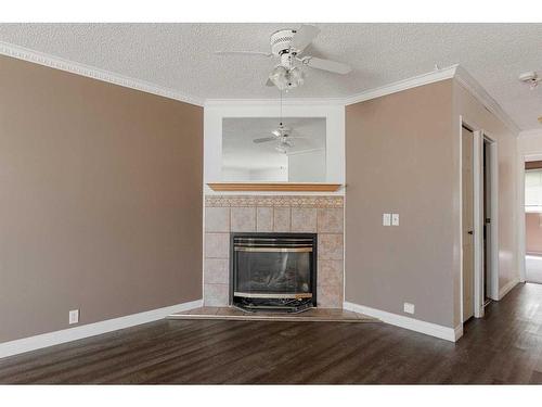 361 Bird Crescent, Fort Mcmurray, AB - Indoor Photo Showing Living Room With Fireplace