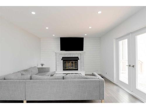 159 Berens Place, Fort Mcmurray, AB - Indoor Photo Showing Living Room With Fireplace