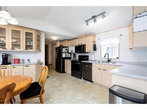 109 Waterhouse Street, Fort Mcmurray, AB - Indoor Photo Showing Kitchen With Double Sink