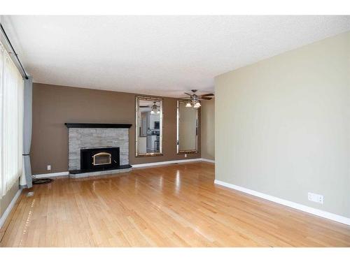 577 Beacon Hill Drive, Fort Mcmurray, AB - Indoor Photo Showing Living Room With Fireplace