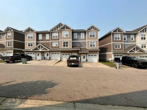 54-180 Riverstone Ridge, Fort Mcmurray, AB - Outdoor With Facade