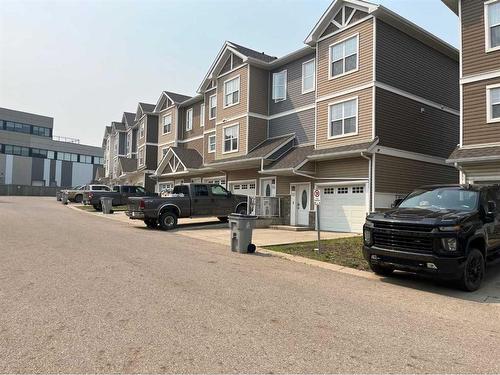 54-180 Riverstone Ridge, Fort Mcmurray, AB - Outdoor With Facade
