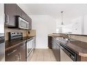 54-180 Riverstone Ridge, Fort Mcmurray, AB  - Indoor Photo Showing Kitchen With Double Sink 
