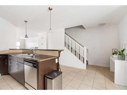 54-180 Riverstone Ridge, Fort Mcmurray, AB - Indoor Photo Showing Kitchen With Double Sink
