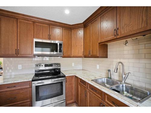 118 Aspenhill Drive, Fort Mcmurray, AB - Indoor Photo Showing Kitchen With Double Sink