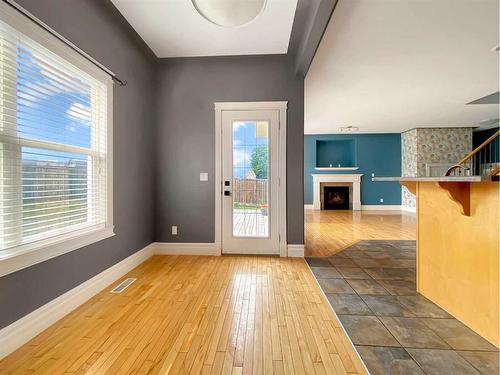 146 Plamondon Way, Fort Mcmurray, AB - Indoor Photo Showing Other Room With Fireplace