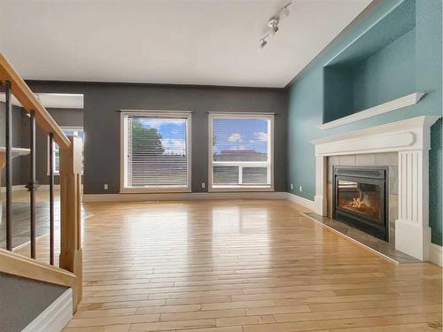 146 Plamondon Way, Fort Mcmurray, AB - Indoor Photo Showing Other Room With Fireplace