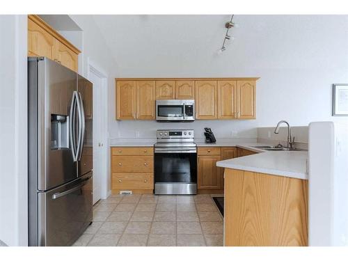 122 Archibald Bay, Fort Mcmurray, AB - Indoor Photo Showing Kitchen With Double Sink