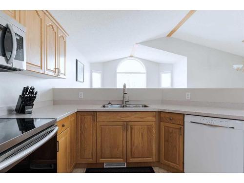 122 Archibald Bay, Fort Mcmurray, AB - Indoor Photo Showing Kitchen With Double Sink
