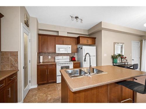 104-113 Fontaine Crescent, Fort Mcmurray, AB - Indoor Photo Showing Kitchen With Double Sink