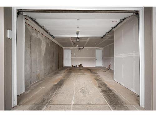 104-113 Fontaine Crescent, Fort Mcmurray, AB - Indoor Photo Showing Garage