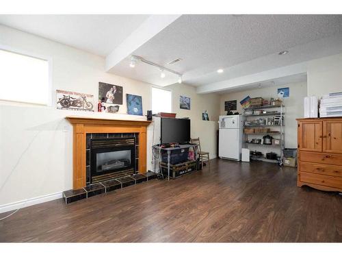 167 Burton Place, Fort Mcmurray, AB - Indoor Photo Showing Living Room With Fireplace