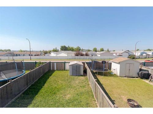 124 Kodiak Crescent, Fort Mcmurray, AB - Outdoor With Backyard