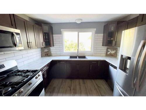 10303 101 St, Lac La Biche, AB - Indoor Photo Showing Kitchen