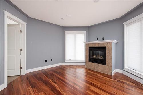 105 Cormorant Place, Fort Mcmurray, AB - Indoor Photo Showing Living Room With Fireplace